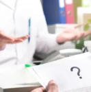 Doctor answering prostate cancer questions for patient