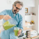Man making smoothie, following a plant-based diet for prostate health