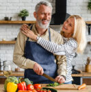 Couple preparing a healthy meal in kitchen
