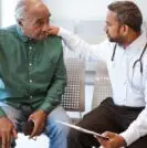 Doctor and older male patient
