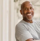Mature man in athletic clothing smiling