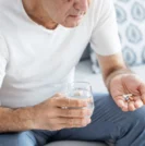 Man taking supplements for prostate health